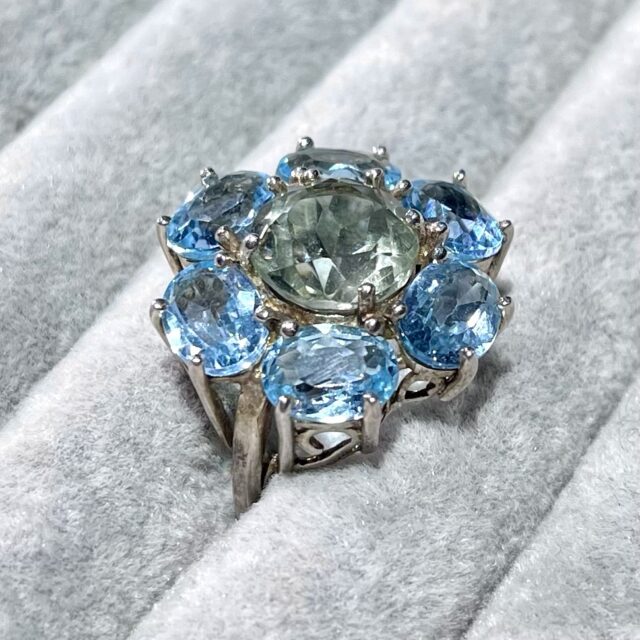 A silver ring with topaz and citrine